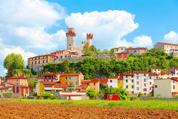 Nozzano Castello and its agricultural crops, medieval village in Tuscany - obrazy, fototapety, plakaty