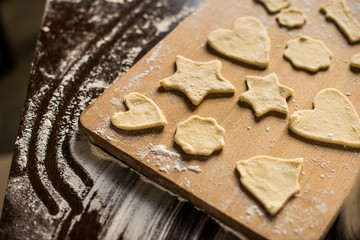 raw cookies on cutting board