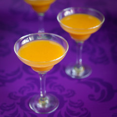 Peach jelly on vibrant violet background