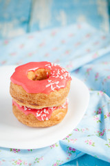 Puff cronuts with pink glaze