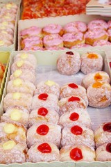 A lot of donut and strawberry jam