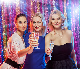 Cheerful women toasting