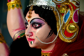 Artisan of West Bengal making clay idol of Godess Durga ahed of Durga festival