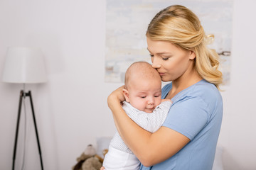 Fototapeta na wymiar mother holding baby