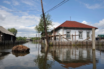 Flood. The river Ob, which emerged from the shores, flooded the outskirts of the city.