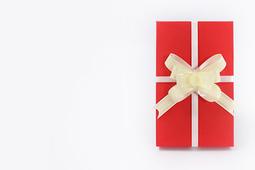 red gift box with bow on white background