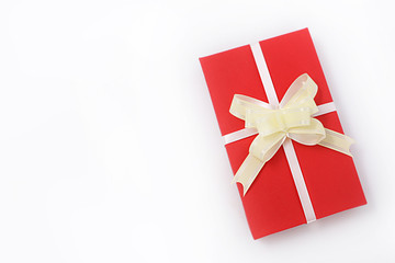 red gift box with bow on white background