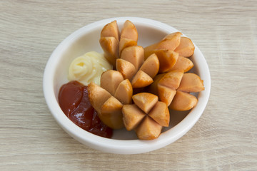 SAUSAGE SNACK BOWL
Deep fried sausage served in a white plate. 