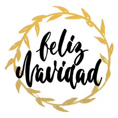 Feliz Navidad - Merry Christmas on spanish, hand drawn lettering quote with golden wreath isolated on the white background. Fun brush ink inscription for greeting card or t-shirt print, poster design.