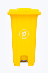 yellow plastic dust bin isolated over white background.