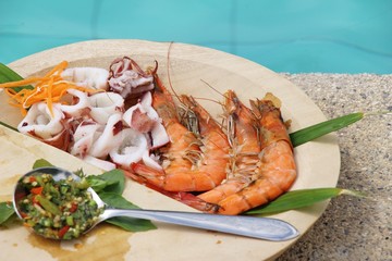 Grilled shrimp and squid with seafood sauce