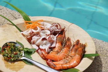 Grilled shrimp and squid with seafood sauce