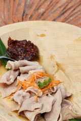Boiled pork with spicy sauce is delicious