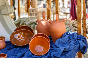  Mud vessel exhibited in a village market
