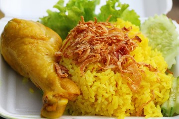 Chicken biryani with rice delicious and sauce