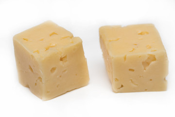 Cube of cheese isolated on a white background