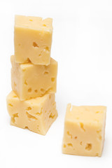Cube of cheese isolated on a white background