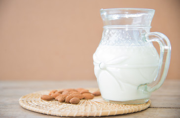 milk in glass on table.
