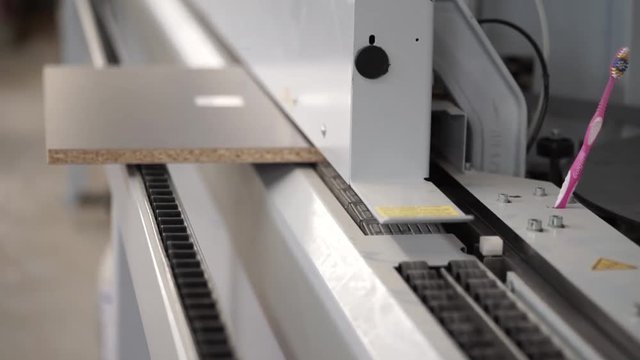 edge gluing in automatic mode. the production of furniture. production process