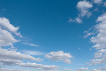 White clouds and blue sky. Blue sky with clouds over horizon.
