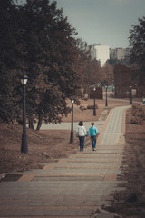 People are walking in the park
