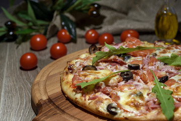 Delicious fresh pizza served on wooden table 