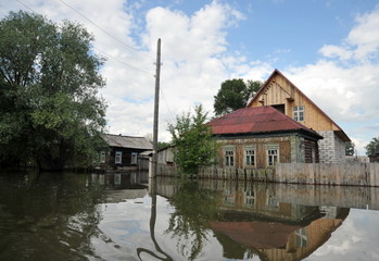 Fototapeta na wymiar Flood. The river Ob, which emerged from the shores, flooded the outskirts of the city.