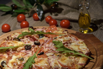 Delicious fresh pizza served on wooden table