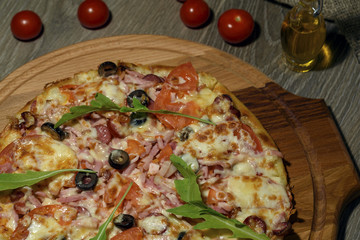 Delicious fresh pizza served on wooden table