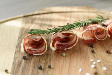Spanish hamon ready for eat ovet the wooden background