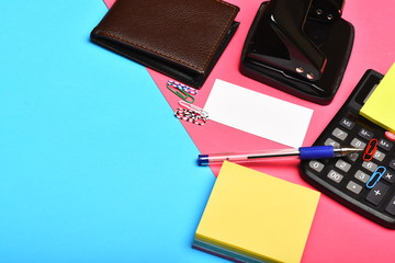 Business and work concept: leather wallet and office tools