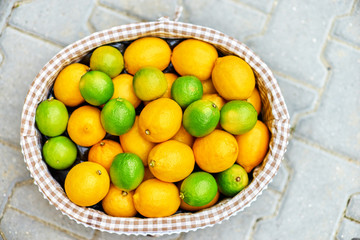 Baskets with lemons in outdoors market of Sorrento, Italy.