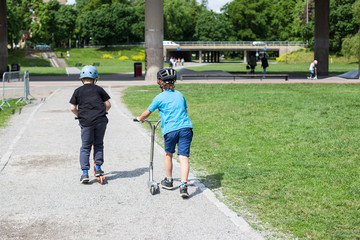 Powerful funny young guys are trained in a skate park