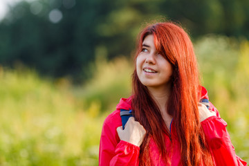 Naklejka premium Photo of smiling girl and with backpack