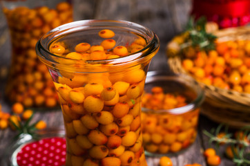 Berries of sea buckthorn with syrup