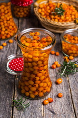 Berries of sea buckthorn with syrup