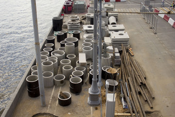 Concrete drainage pipes for industrial building construction.