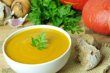 Warm tasty autumn creamy pumpkin soup