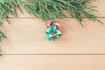 christmas tree with christmas decoration on wood background