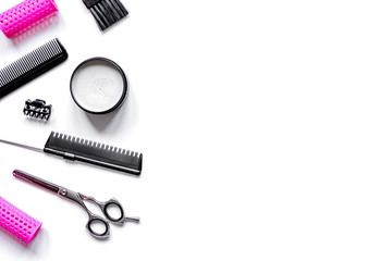 Tools for hair styling on white background top view
