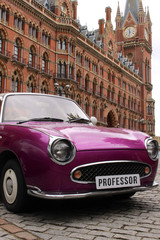 Antique British Car with European City Architecture Building