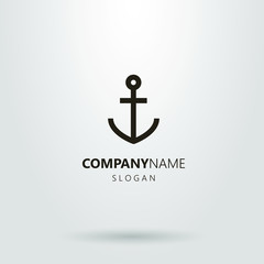 Black and white simple vector line art logo of an anchor © George_Chairborn