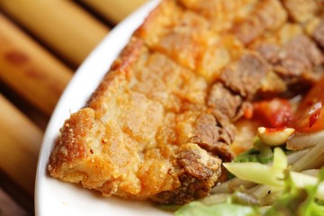 Spicy long bean with crispy pork , salted egg