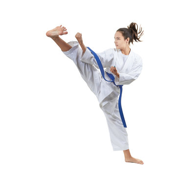 In karategi, an adult sportswoman beats blow leg