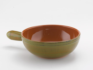 terracotta pan on white background