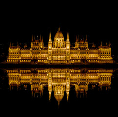 Fototapeta premium Budapest Parliament in Hungary at night on the Danube river