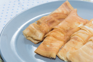 crepe roll with egg,Thai dessert on plate