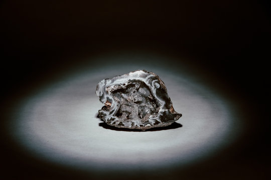 Broken Open Quartz Rock Illuminated By Spotlight