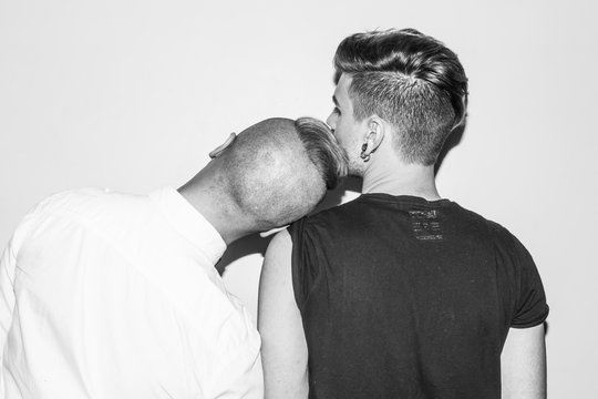 fashionable gay couple in love,hairstyle,fashion