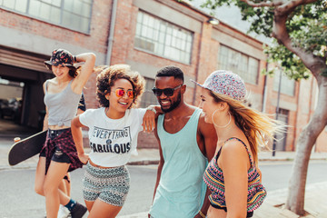 Group of young people walking in the city